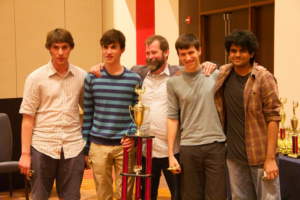 The members of the 2014 HSNCT Champion LASA A team along with their coach, Jason Flowers. All four were students at Texas Quiz Bowl Camp in years past. 